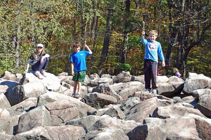 kids playing on rocks