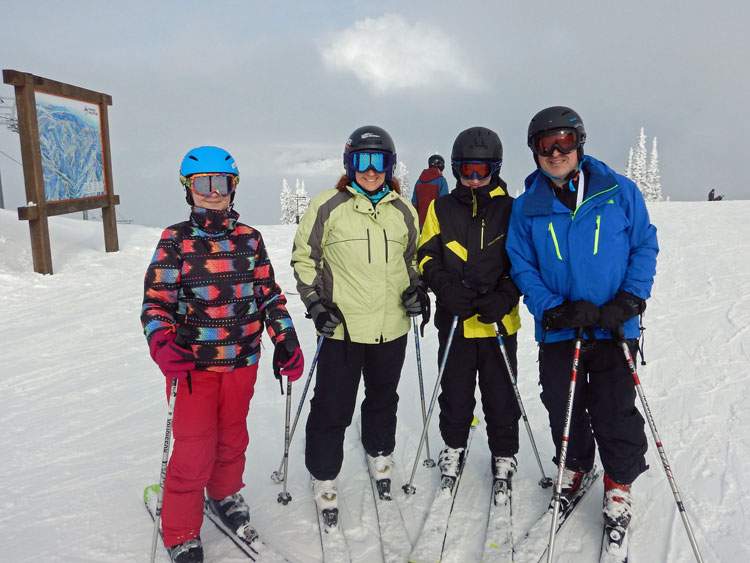 family on the ski slopes