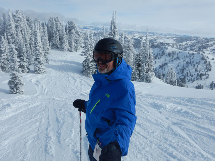 man on snowy mountain