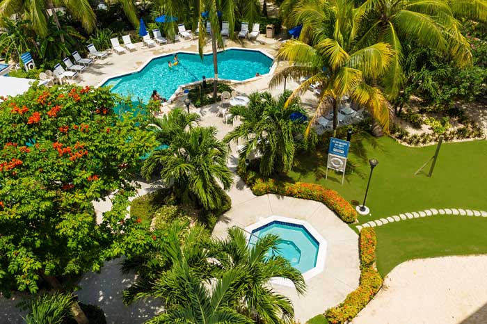 The tropical grounds of Comfort Suites & Resort, Cayman Islands.