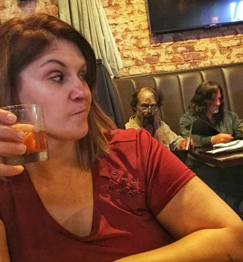 Eating dinner with zombies behind me.