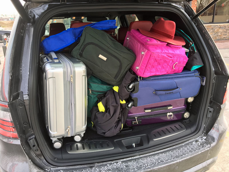 trunk stuffed with luggage