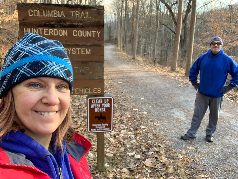 man and woman on hiking trail