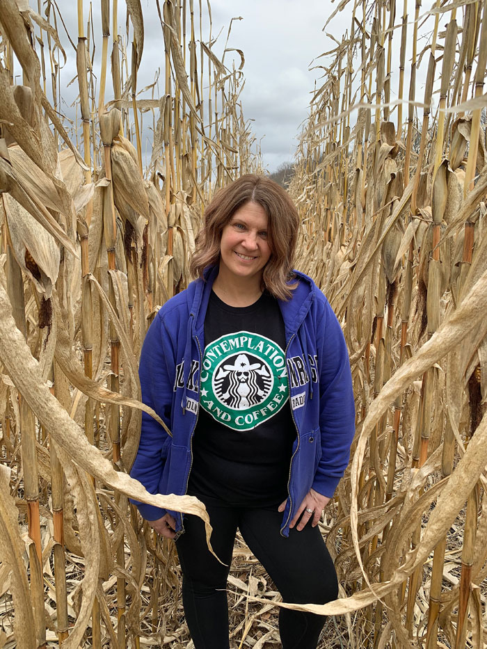 woman in a cornfield