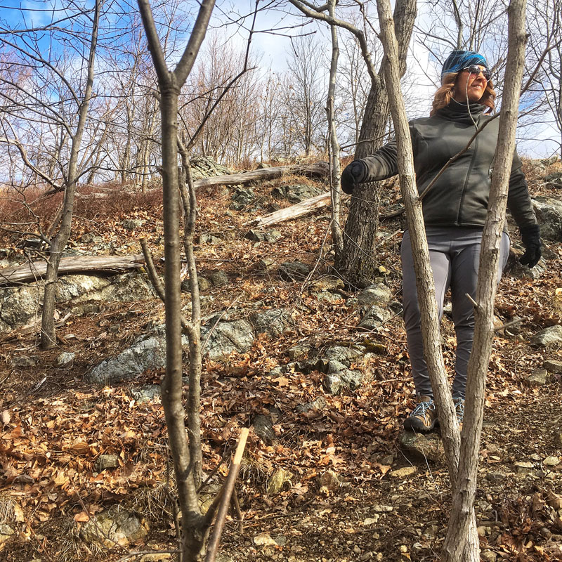 Shannon hiking on trail in forest