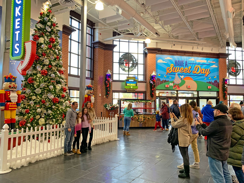 Family in front of Christmas Tree at Hershey's Chocolate World.