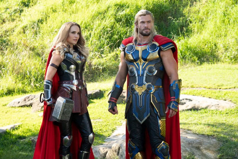 Mighty Thor and Thor standing together.